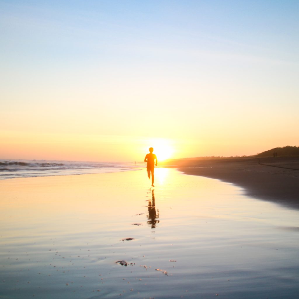 Man running on the beach